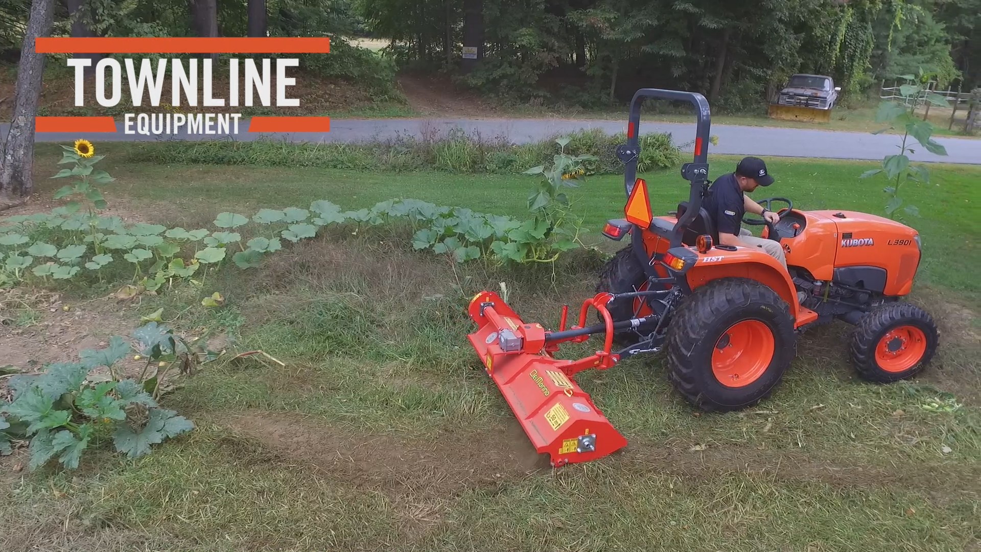 Kubota Standard L Series Tractor With Rototiller and Flail Mower