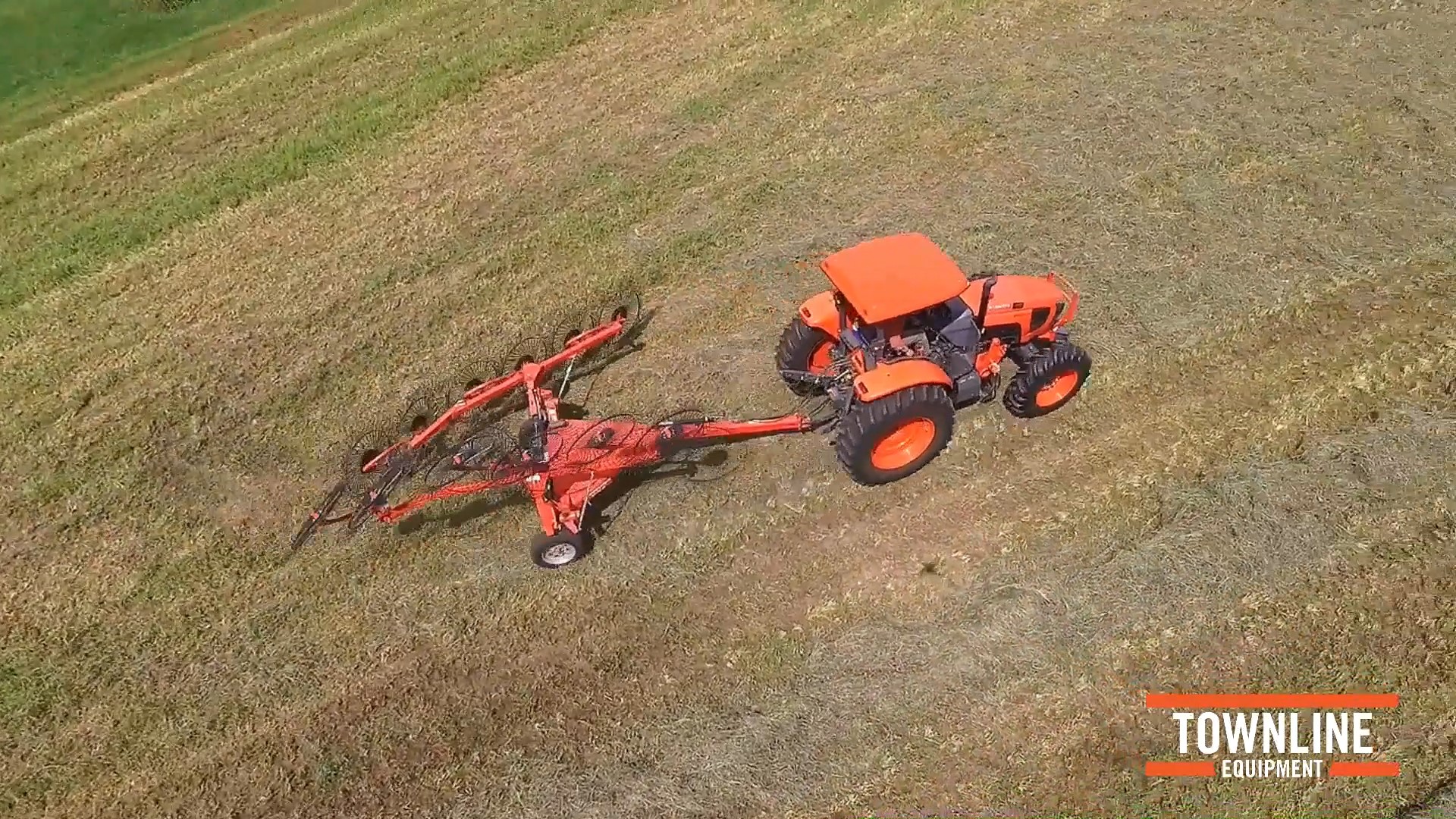 Performing Second Cut with a Kubota M6 Tractor and Kuhn SR 112 Speed Rake